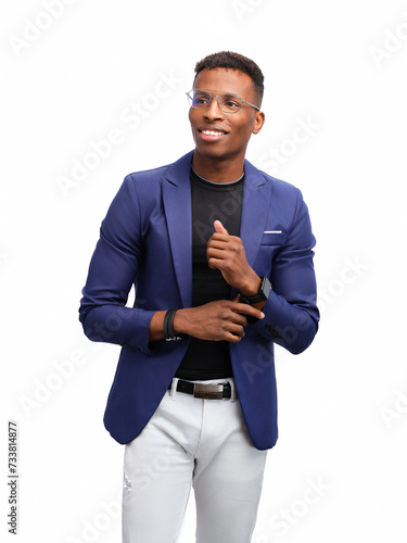 Confident black male in a blue blazer smiling and in a happy mood. African-American man with a positive attitude in fashionable casual attire. Trendy and modern look.