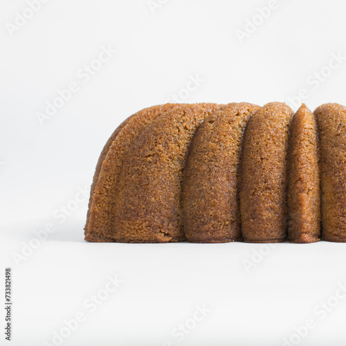 Homemade pound cake loaf on a white table, fresh brown sugar loaf cake on a white background