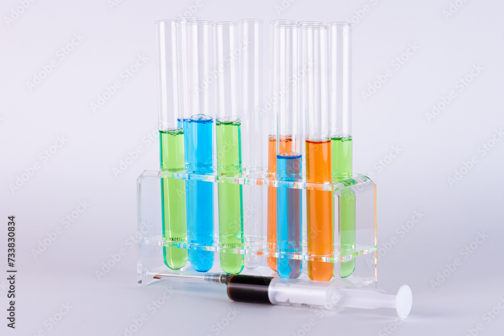 Laboratory test tubes on white background, science and medical concept. Laboratory test tubes on white background, science and medical concept.
