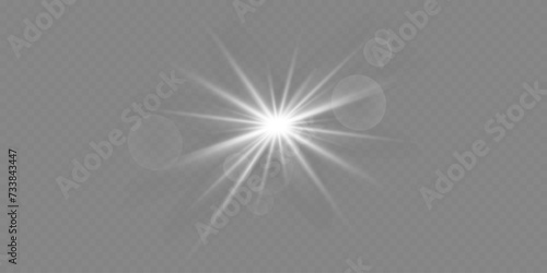 White glowing light explodes on a transparent background. A flash of a star and a glare of rays.