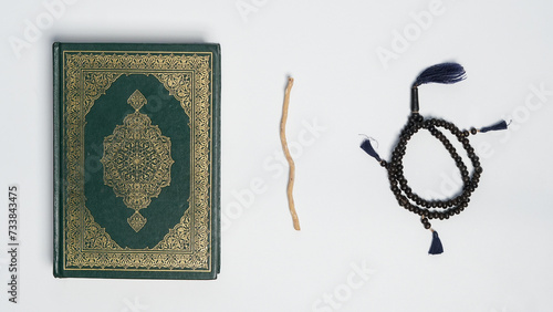 Muslim prayer equipment on white background