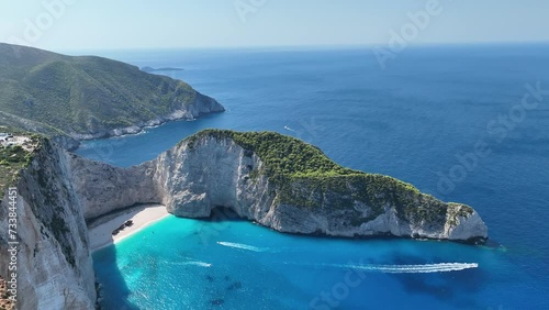 Aerial drone view of Navagio beach on Zakynthos island, Greece. Shipwreck on the beach in Zakynthos island, Greece. Shipwreck Beach or Agios Georgios. is exposed cove in the Ionian Islands of Greece. photo