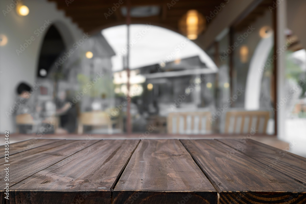 Empty wooden table with blurred background of cafe and restaurant. Empty wooden table with blurred background of cafe and restaurant.