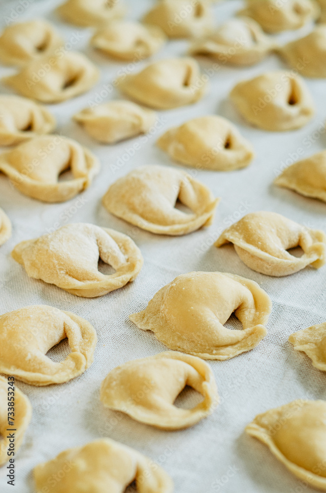 Home made dumplings on white linen cloth Home made dumplings on white linen cloth