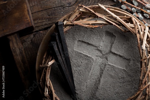 Cross crucifix made of ash, christian religion. © BillionPhotos.com