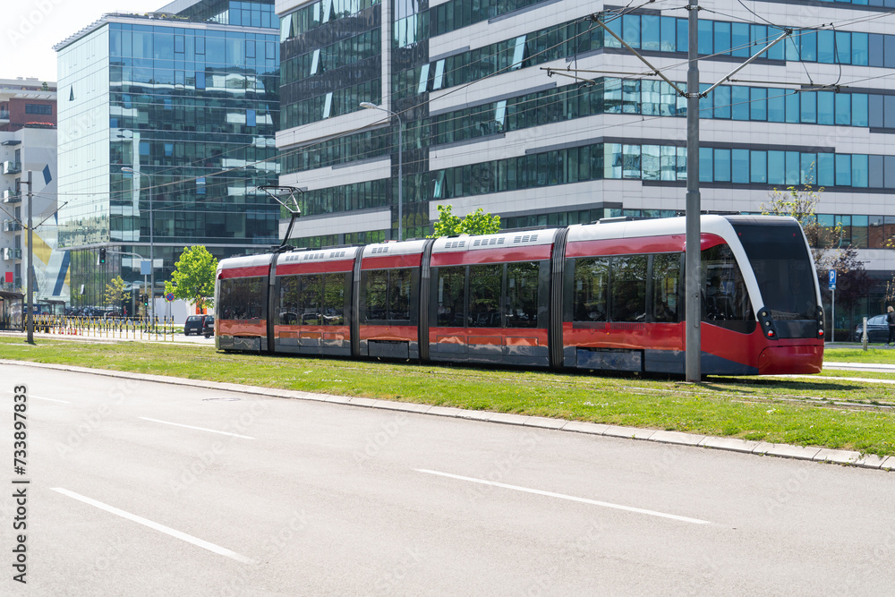 Obraz premium Modern tram on the city street.