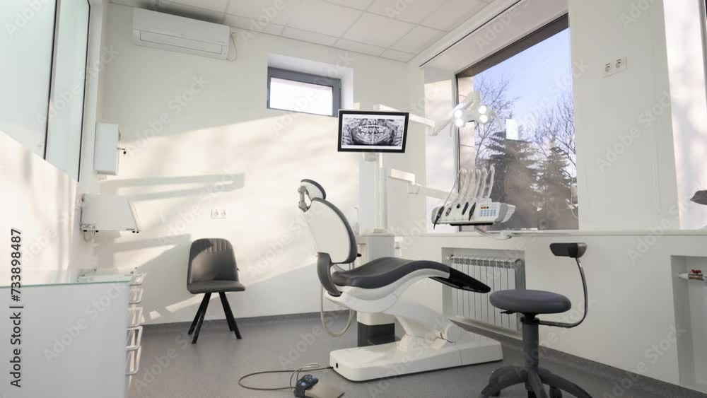 Dentistry office with professional modern equipment. Empty minimalistic stomatology office with dental unit, chair and professional equipment. Dental chair in the medical clinic. Workplace of dentist. Dentistry office with professional modern equipment. Empty minimalistic stomatology office with dental unit, chair and professional equipment. Dental chair in the medical clinic. Workplace of dentist.