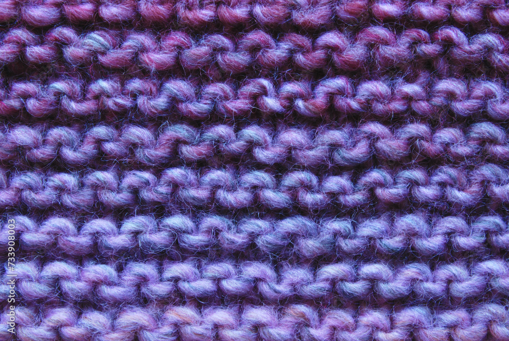Purple color purl knit surface texture as background