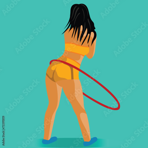 Pretty girl is twisting hula loop with gym kit. figure from behind  