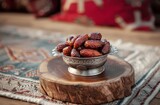 Dates arranged neatly in a metal bowl on a wooden board, islamic iftar image