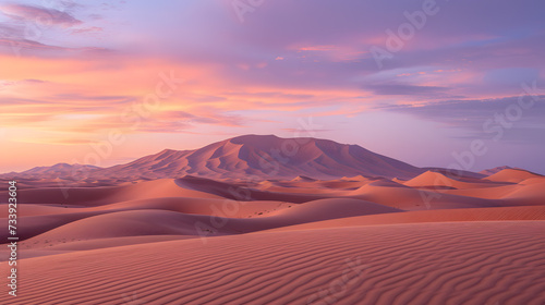 A photo of the Sahara Desert  with endless sand dunes as the background  during a dramatic sunrise