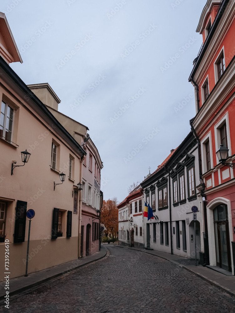 A street in Vilnius Old Town in autumn. Old town architecture. Glass Quartet (Stiklo Kvartalas)