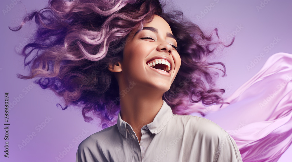 Joyful young woman with vibrant curly hair and a contagious smile Stock ...