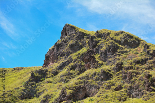 Green Rocky Hill In The Island