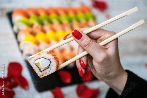 Assorted tasty japanese sushi rolls on a plate. st. Valentine concept
