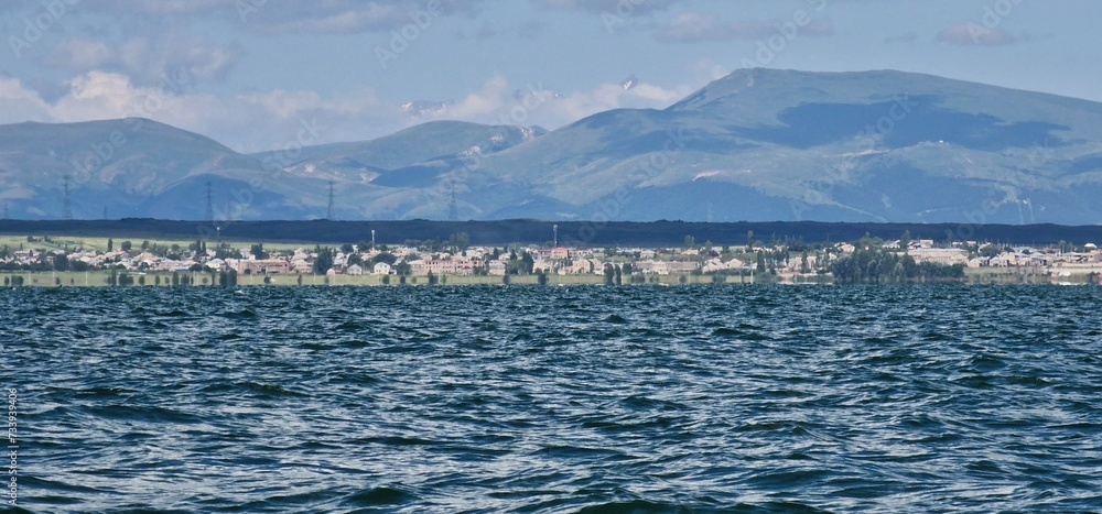 Fototapeta premium Lake Sevan is a large, high-altitude lake in eastern Armenia. It's known for its beaches. Set on a narrow peninsula, the Sevanavank Monastery has 2 stone churches dating to the 9th century. To the sou