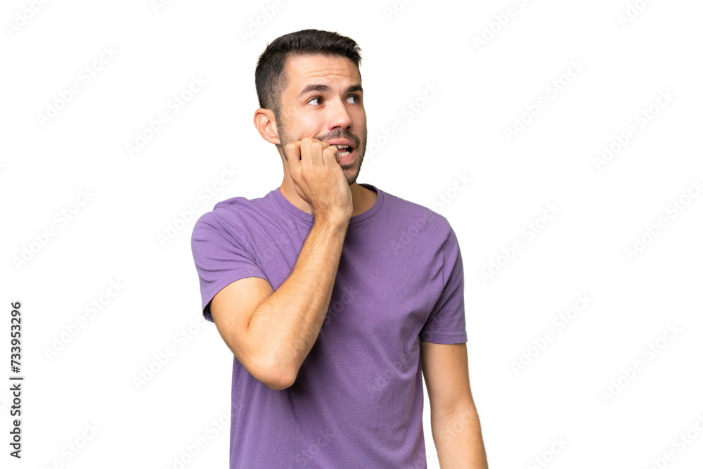 Young handsome caucasian man over isolated background is a little bit nervous Young handsome caucasian man over isolated background is a little bit nervous