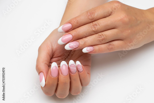 French wedding manicure with white web and silver dots on long oval nails
