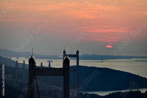 Sunset in the Hong Kong International Airport with Tsing Ma Bridge photo