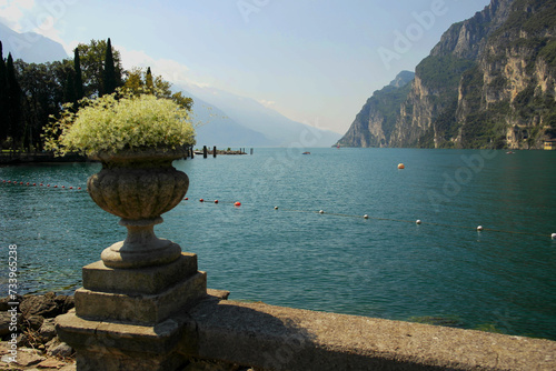 View of Lake Garda with beautiful flowers, Riva del Garda, Italy