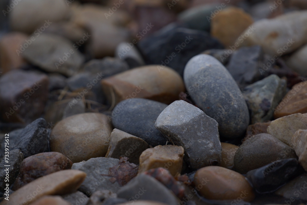 Macro of pile of multicoloured pebbles Macro of pile of multicoloured pebbles