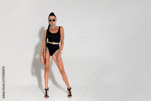 Skinny woman strip. Black lingerie