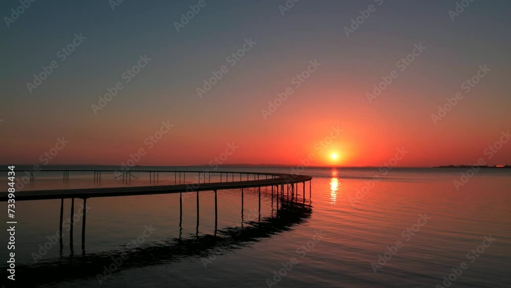 Sunset on the lake Sunlight reflected on the water Walking on the pier, Slow motion 4K
Sunset on the lake Sunlight reflected on the water Walking on the pier, Slow motion 4K