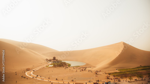 Crescent Moon Spring in Mingsha Mountain, Dunhuang City, Gansu Province - Desert scenery under a clear sky