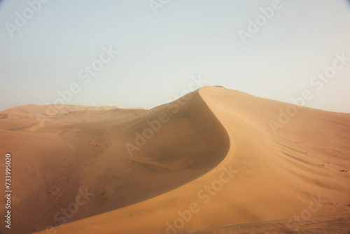 Crescent Moon Spring in Mingsha Mountain  Dunhuang City  Gansu Province - Desert scenery under a clear sky