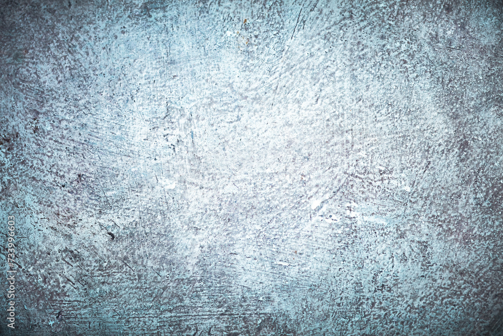 Light cyan rustic cement wall background. Textured concrete surface.