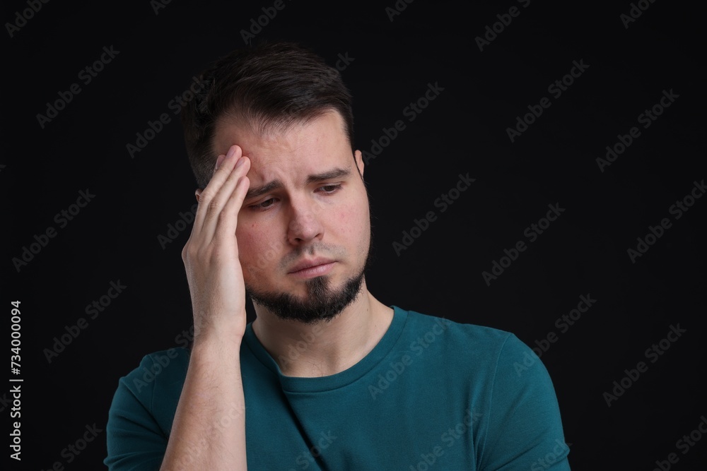 Portrait of sad man on black background Portrait of sad man on black background