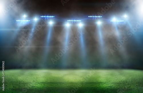 Green soccer field, bright spotlights,	 photo