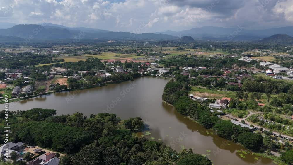 Aerial view of Nong pueng lake the man made lake nearly the downtown of Chiang Rai province, Thailand. Aerial view of Nong pueng lake the man made lake nearly the downtown of Chiang Rai province, Thailand.