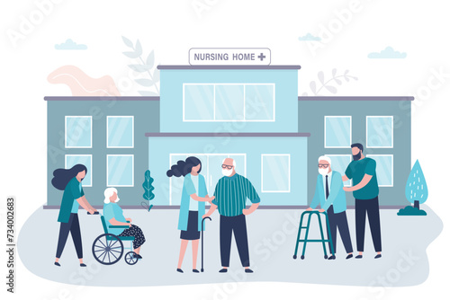 Elderly people are walking in the park. Nursing home building exterior. Nurse help old people to walk in park. Volunteering, support for elderly.