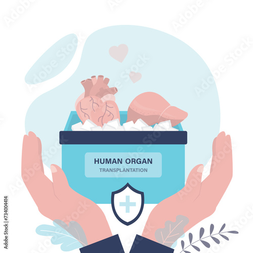 World organ donation day. Hands holding box with various healthy donor human organs. Transplantology, surgery and healthcare.
