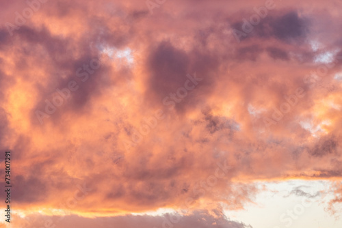 Sunset with orange golden clouds  background with copy space