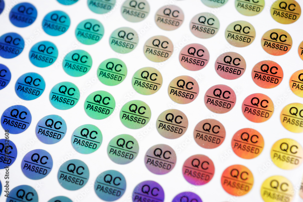 Close-up of stickers with text QC passed Close-up of stickers with text QC passed