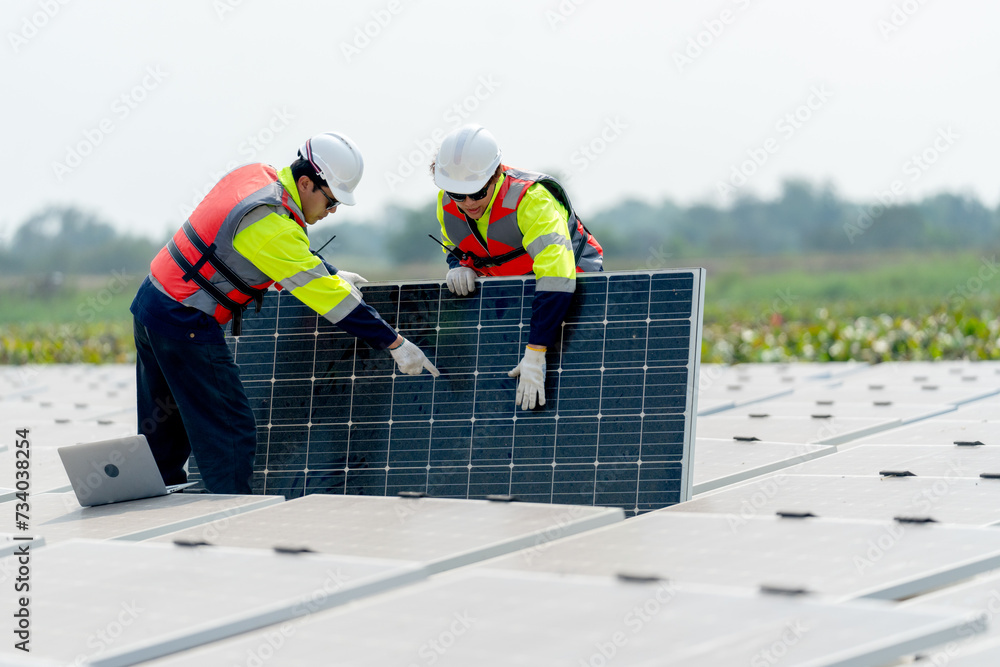 custom made wallpaper toronto digitalClose up one technician worker stand and point to area of problem and work with co-worker who stand and touch to check the problem of solar cell panel in the network system.