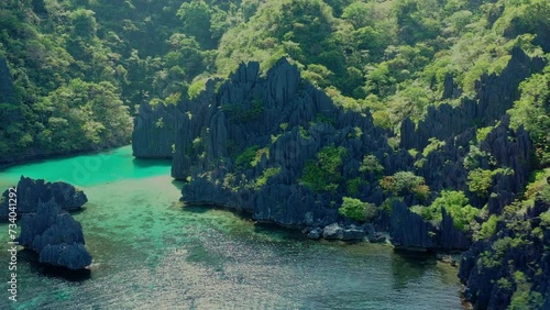 Aerial view of the typical rocks with trees of Miniloc Island in the Philippines photo