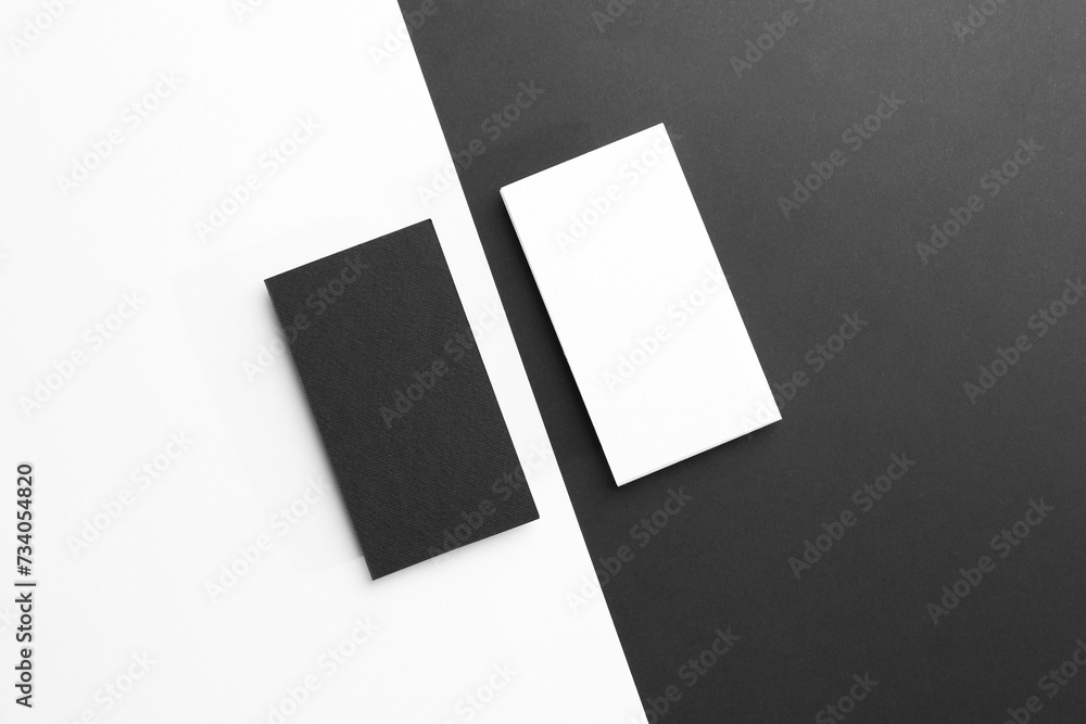 Blank business cards on color background, flat lay. Mockup for design Blank business cards on color background, flat lay. Mockup for design