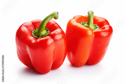 Vibrant Red Bell Peppers: A Fresh and Healthy Ingredient Composition on a White Background