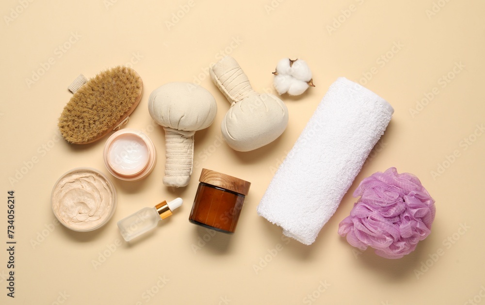 Bath accessories. Flat lay composition with personal care products on beige background Bath accessories. Flat lay composition with personal care products on beige background