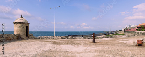 Panoramic view of the lookout tower on the walls of Cartagena de Indias (Colombia), located between Santander Avenue and the colorful colonial city, including the sea