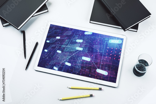 Top view of modern digital tablet display with abstract software development hologram, research and analytics concept. 3D Rendering