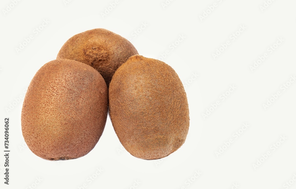 Kiwi Fruit or Chinese Gooseberry Stack Isolated on White Background with Copy Space in Horizontal Orientation Kiwi Fruit or Chinese Gooseberry Stack Isolated on White Background with Copy Space in Horizontal Orientation