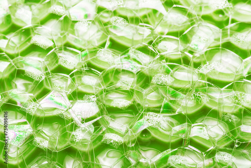 Eco suds. Green foam. Ecology texture. Water foam texture. Foam structure. Bubble background. Washing suds pattern. Chemical detergent backdrop. Blue foam. Suds background.