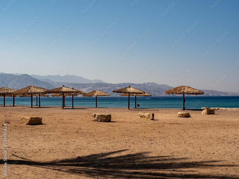 Fototapeta premium beach with umbrellas and chairs, Eilat, Israel