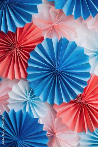 A vibrant collection of red, white, and blue paper fans, perfect for adding a festive touch to any occasion.
