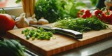 A picture of a cutting board with a knife and various vegetables. This image can be used to showcase cooking, healthy eating, meal preparation, or culinary concepts