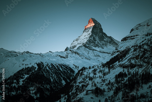 Matterhorn sunrise and snow covered mountains in winter